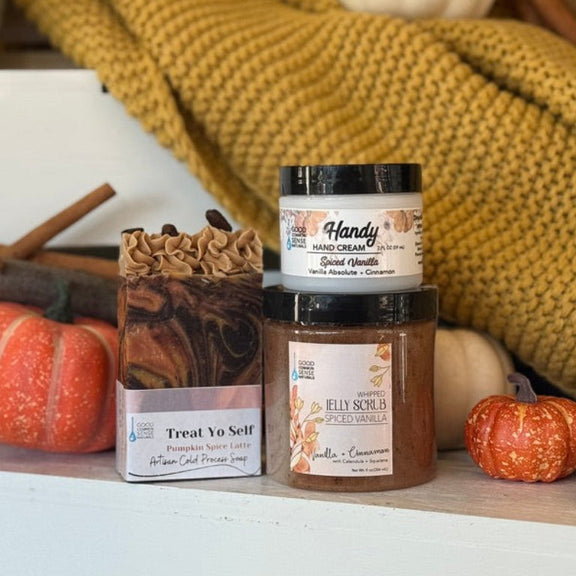 Glow Up Spiced Vanilla gift set featuring the Spiced Vanilla Jelly Scrub, Treat Yo Self artisan soap, and Handy Hand Cream in Spiced Vanilla, Good Common Sense Naturals