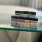 Mini Handy Lotion Collection 0.25 oz Gift Set 7 mini handys stacked on blured surface 
