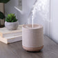 Natural linen ultrasonic essential oil diffuser on a hallway table, Good Common Sense Naturals