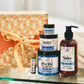 A gift set containing a Native body lotion, Olive You Sugar Scrub, Handy cream, Lip balm, Mini Handy, and a gift box, displayed next to a decorative box with orange paper and floral patterns.