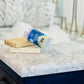 A bottle of 'Sleepy Time' bubble push pop bath additive on a marble surface with a bathroom background.