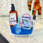 Native Lavender Plains Body Lotion
, Travel Grain Rain Hand Sanitizer, Salvation Lavender Lotion Bar, Tortoise Organic Lip Balm, I Loofah Lavender Bar Soap, Unwind&nbsp;Essential Oil Roller in a clear Bathtub Gift basket