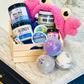 a gift set wooden box on counter filled with Olive you Scrub, Handy Cream 4 oz, Who's Vick Shower Tablet, Spear Me Shower Tablet, Swampthing 8 oz, Beet it Lip Scrub, 3 Ball Bath bombs, Lip balm, Crabby Spa Headband 