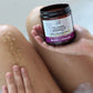women spredding exorcist scrub on legs with blured backround 