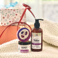 Native lavender plains body lotion with a loofah soap and a handy lavender hand cream. On a textured surface 