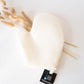 smooth side of the Love Your Body Glove on a white background 