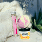 handy hand cream under a bath bomb with bath salts in background 