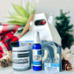 4 skin care products in a Facial Gift Set Set includes: Feather Light AM 2oz, Zit Zap Wow Acne roller, Swampthing 8.5 oz, Cleansing Facial Bar Soap with a nature background 